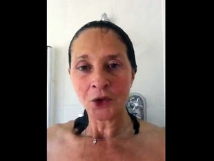 Big-boobed grandmother taking a shower. Looks like a great